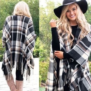 Brand new in bag Gray plaid poncho scarf. One size fits most.